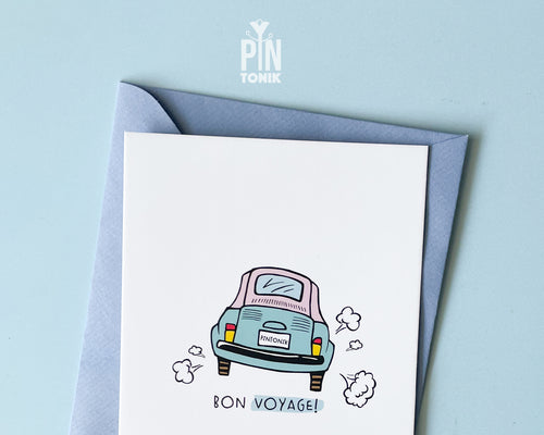 Premium postcard with an original illustration of a light blue retro car and the text 'Bon Voyage!', shown held against a light blue background.