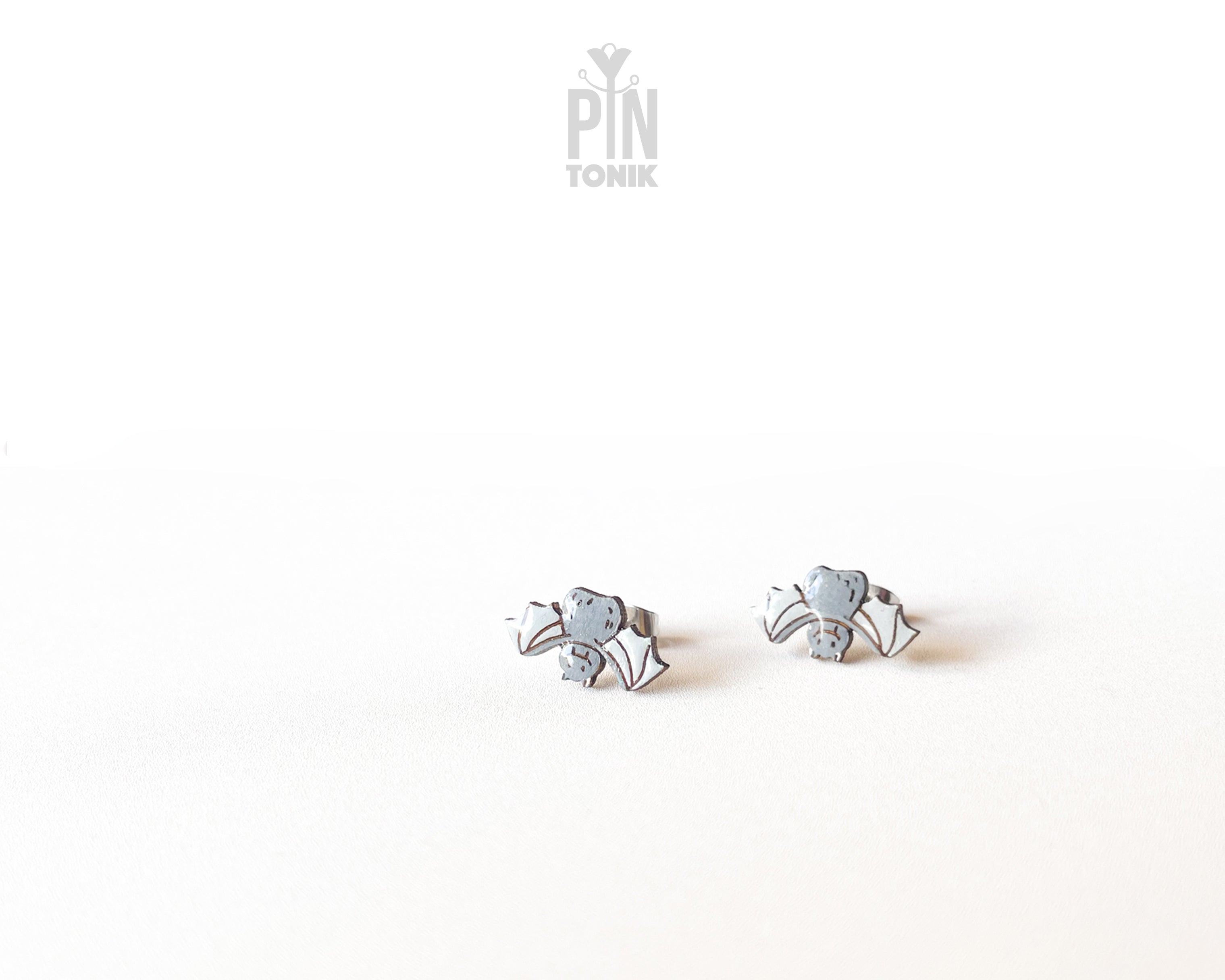 Handmade wooden grey bat stud earrings with outstretched wings by PinTonik, playful spooky and animal themed jewelry.