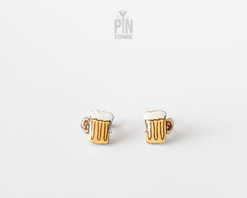 Handmade wooden beer mug stud earrings with golden beer and frothy white foam by PinTonik.