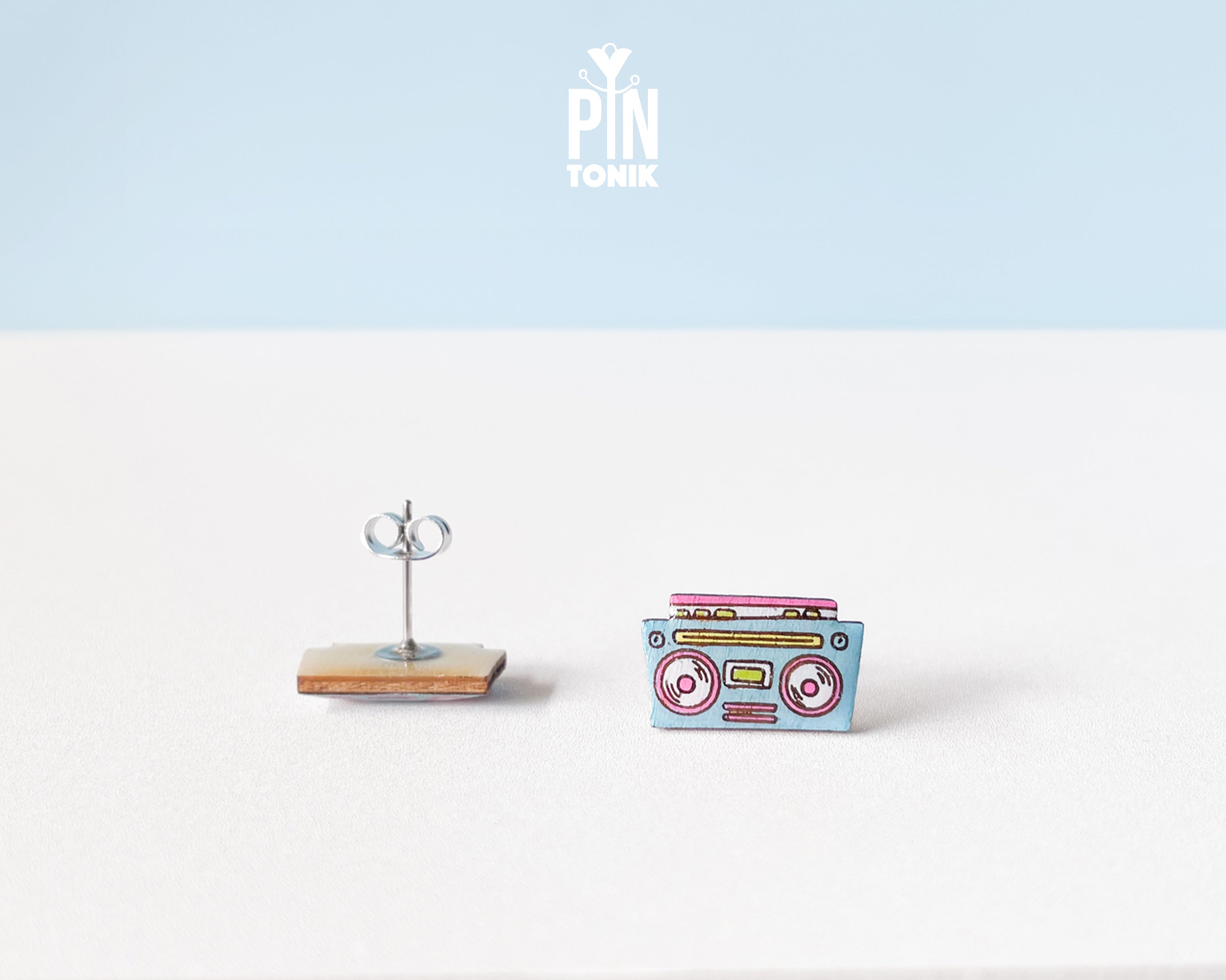 Handmade wooden retro boombox cassette player stud earrings in pastel blue and pink pop-art colors by PinTonik.