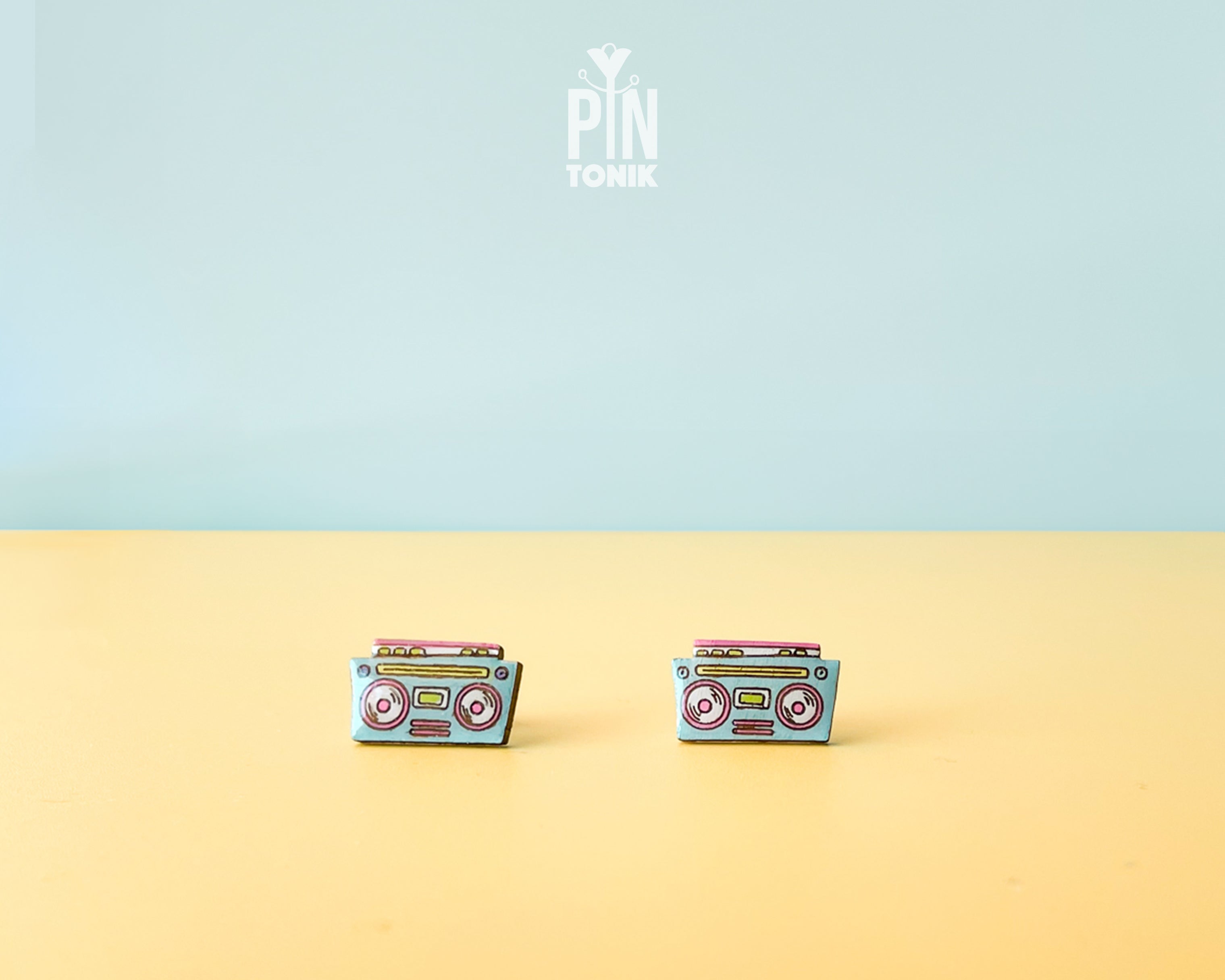 Handmade wooden retro boombox cassette player stud earrings in pastel blue and pink pop-art colors by PinTonik.