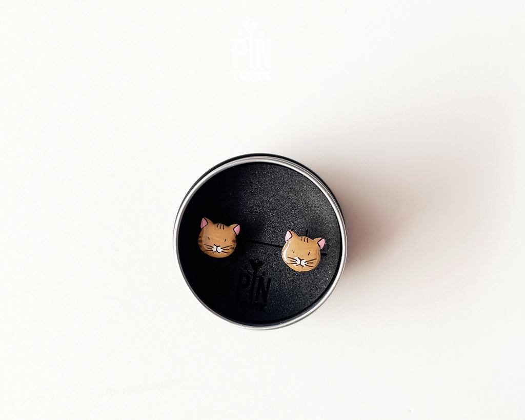 Pair of hand-painted ginger wooden cat stud earrings with a high-gloss protective resin finish