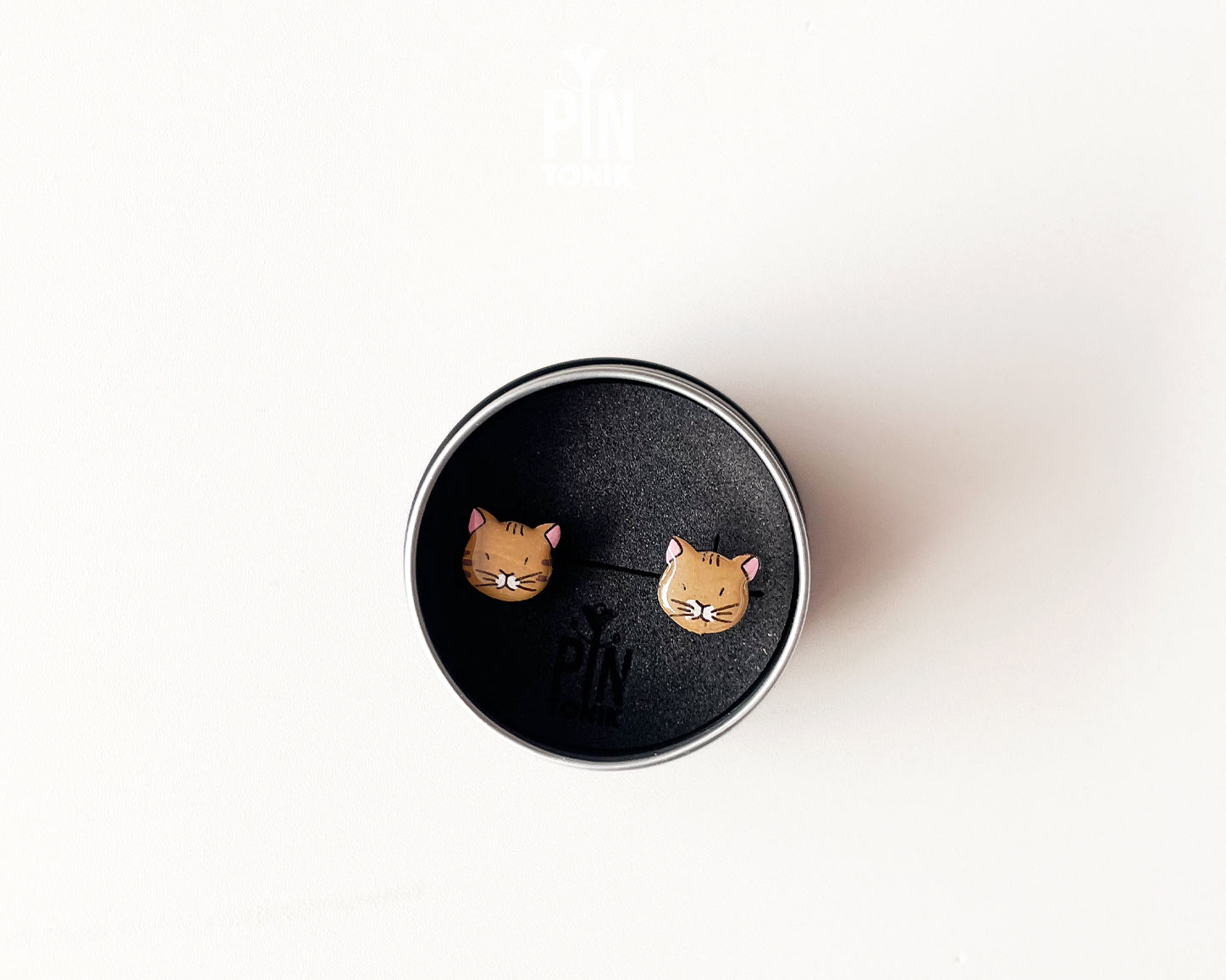 Pair of hand-painted ginger wooden cat stud earrings with a high-gloss protective resin finish