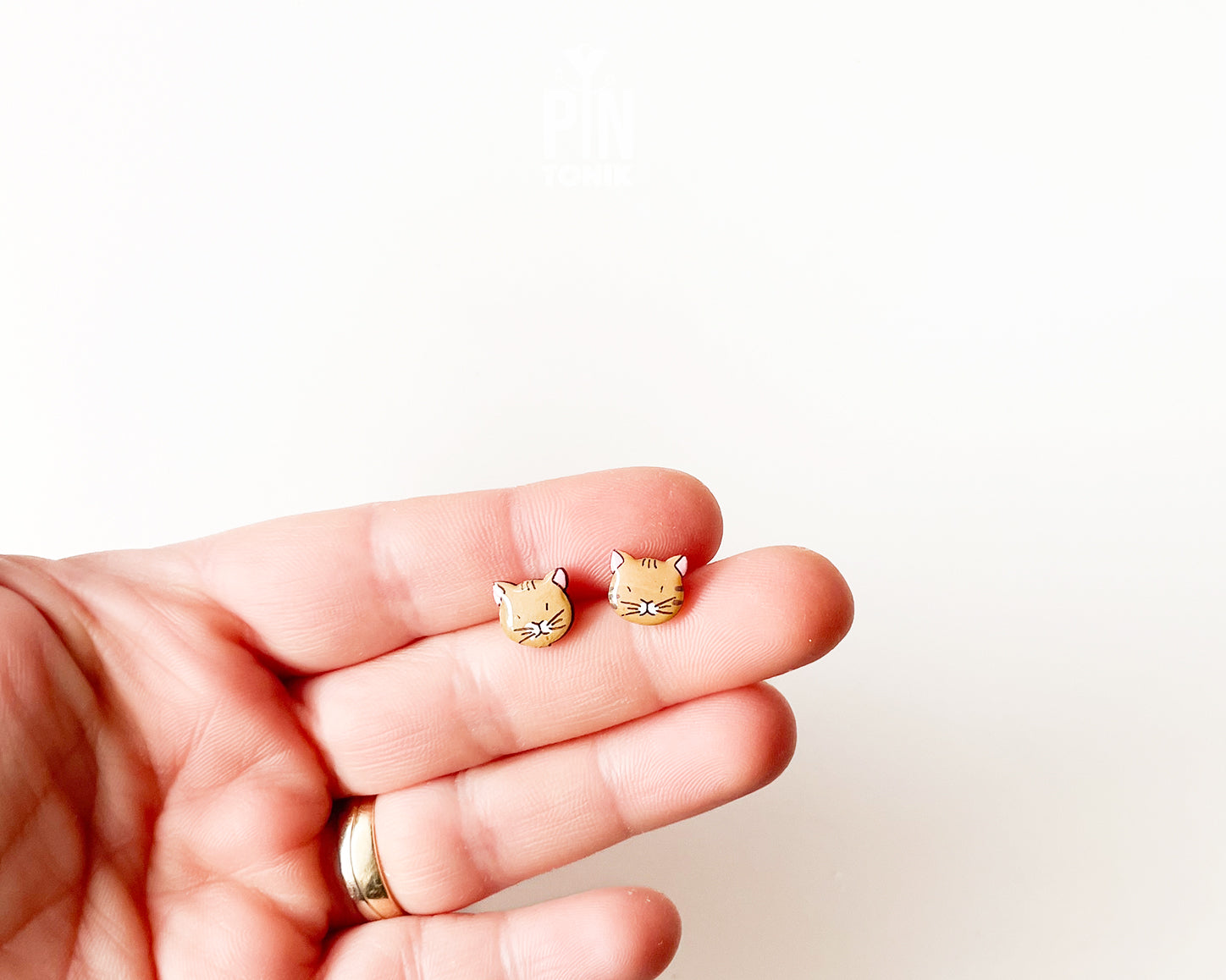 Pair of hand-painted ginger wooden cat stud earrings with a high-gloss protective resin finish