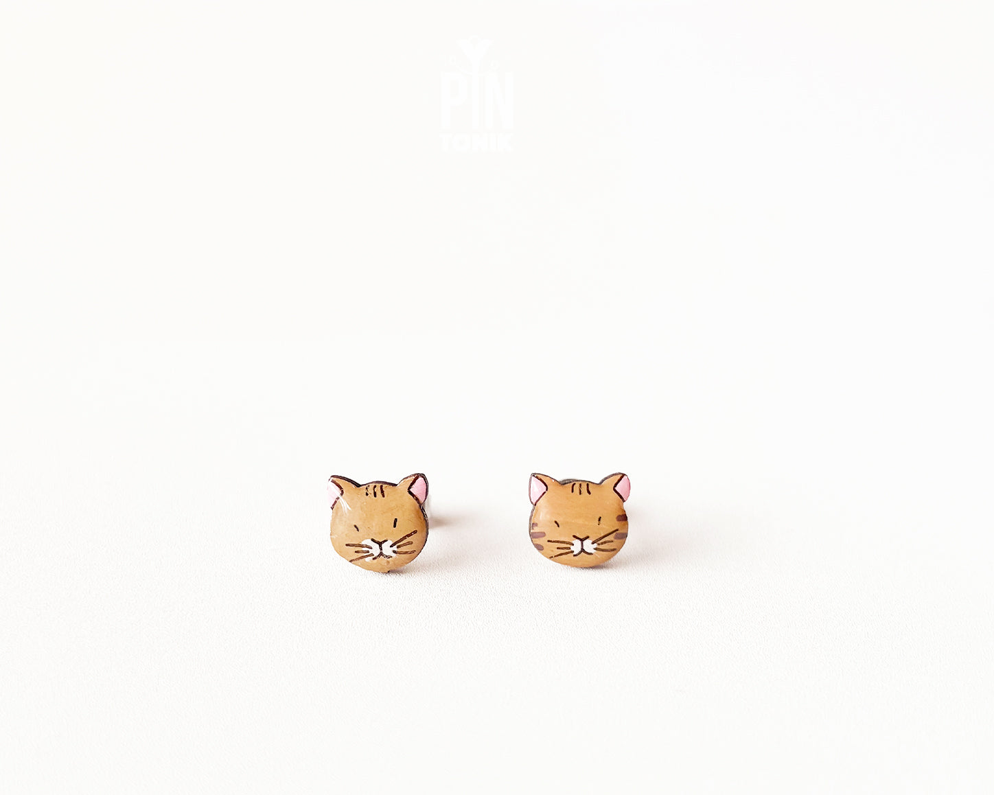 Pair of hand-painted ginger wooden cat stud earrings with a high-gloss protective resin finish