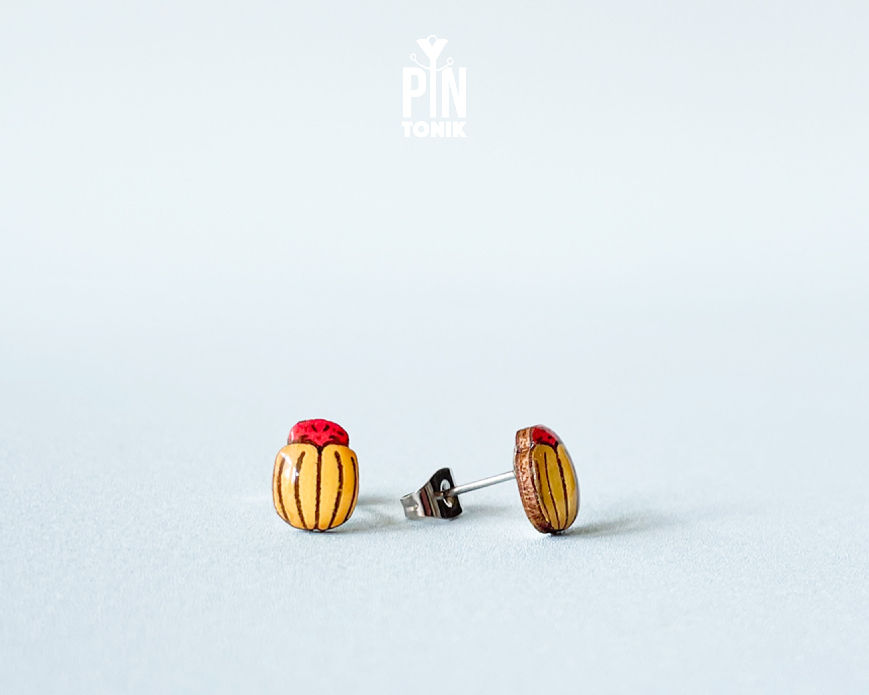 Handmade wooden Colorado potato beetle stud earrings with yellow and black stripes and a red head by PinTonik.