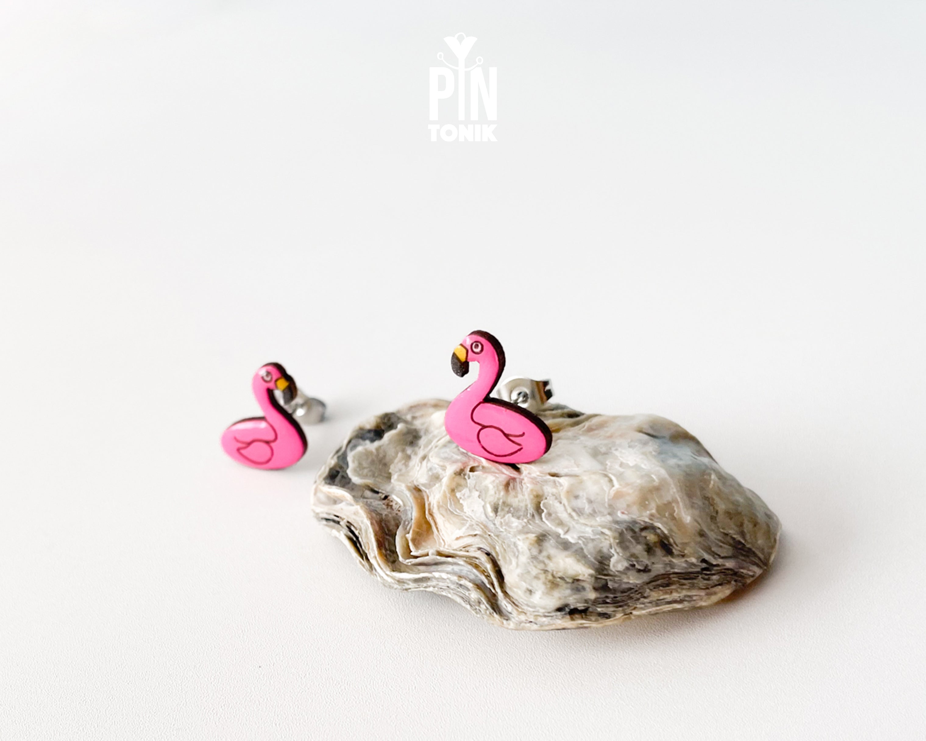 Handmade wooden pink flamingo pool floatie stud earrings by PinTonik.