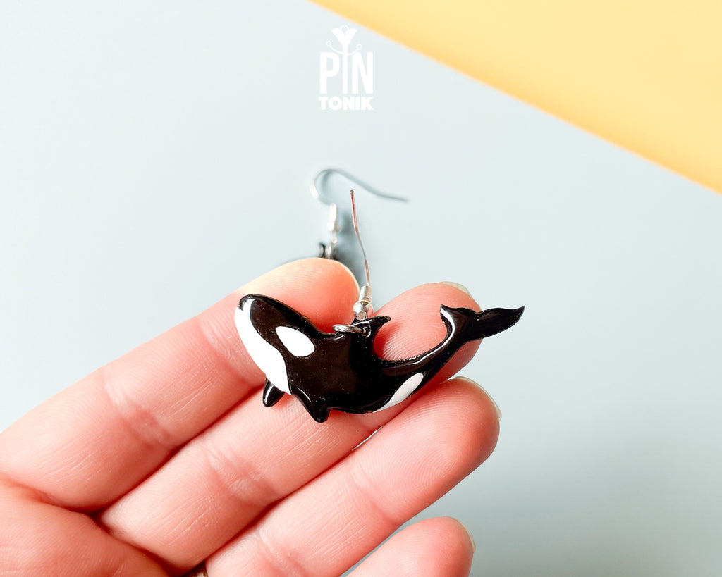 Hand-painted wooden orca whale dangle earrings on sterling silver hooks with a glossy resin finish