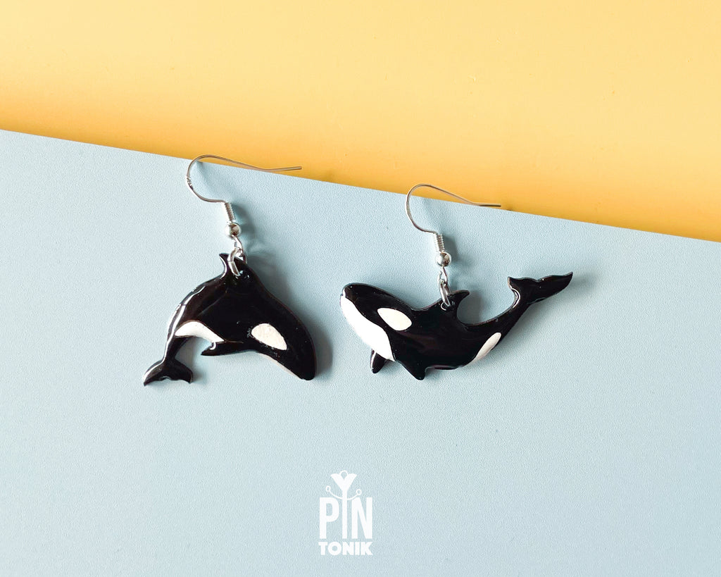 Hand-painted wooden orca whale dangle earrings on sterling silver hooks with a glossy resin finish