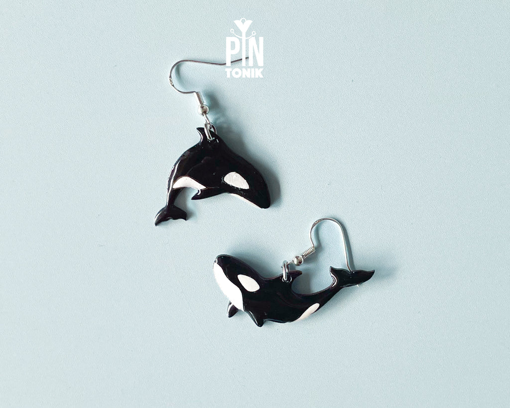 Hand-painted wooden orca whale dangle earrings on sterling silver hooks with a glossy resin finish