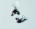 Hand-painted wooden orca whale dangle earrings on sterling silver hooks with a glossy resin finish