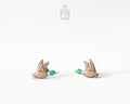 Pair of hand-painted wooden flying mallard duck stud earrings with wings spread and a glossy resin finish