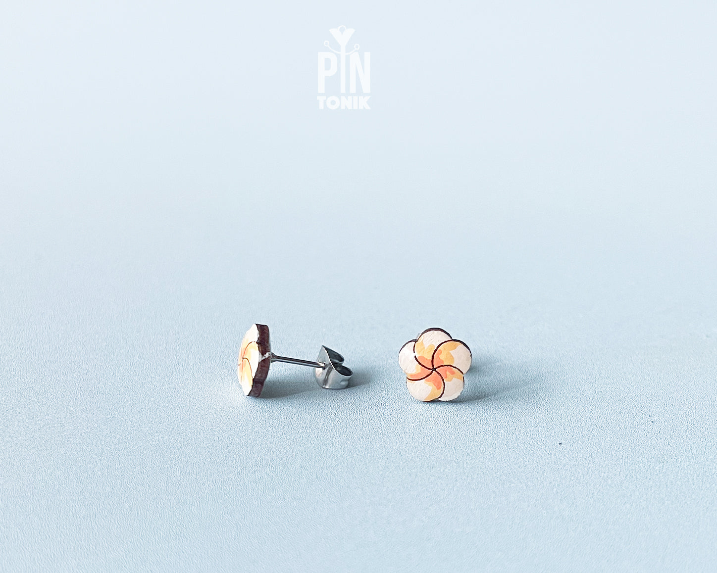 Hawaiian style white and yellow plumeria flower character stud earrings by PinTonik, hand-made in Austria.