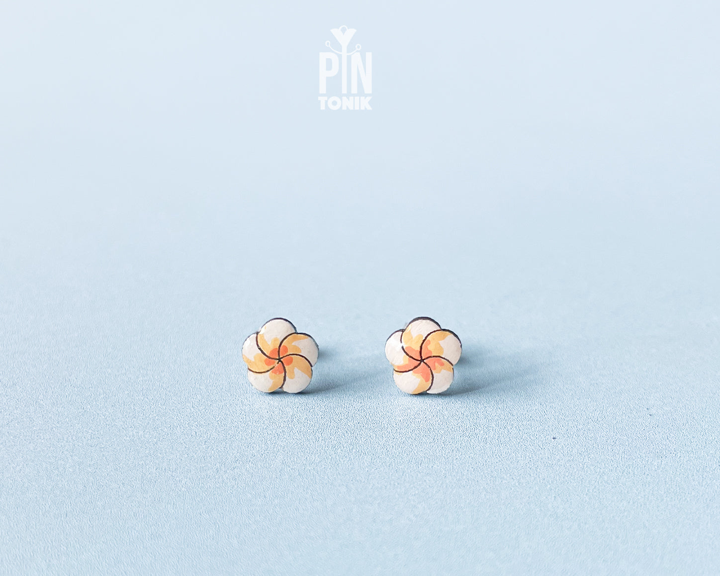 Hawaiian style white and yellow plumeria flower character stud earrings by PinTonik, hand-made in Austria.