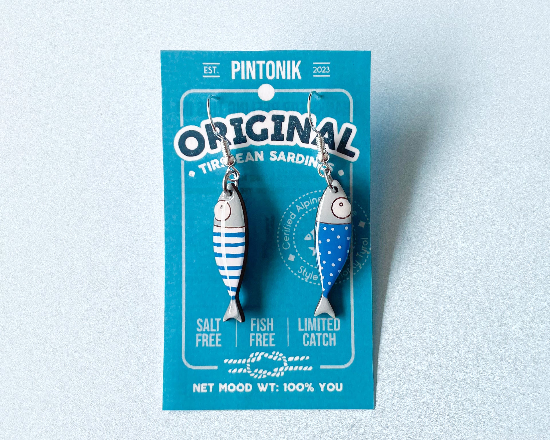 Hand-painted wooden sardine dangle earrings in various colors (blue, red, striped) on sterling silver hooks