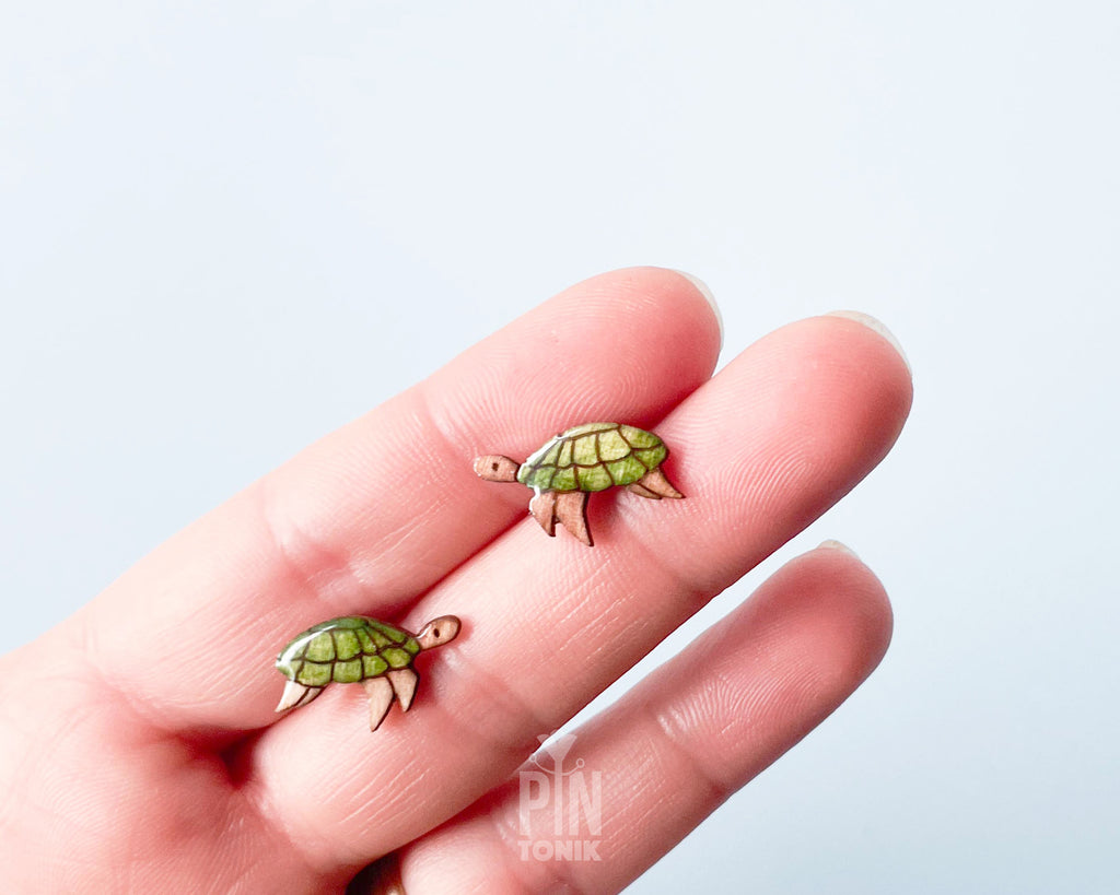 Handmade wooden sea turtle stud earrings with a beautiful teal and green shell design, Hawaiian honu beach style tropical jewelry by PinTonik.