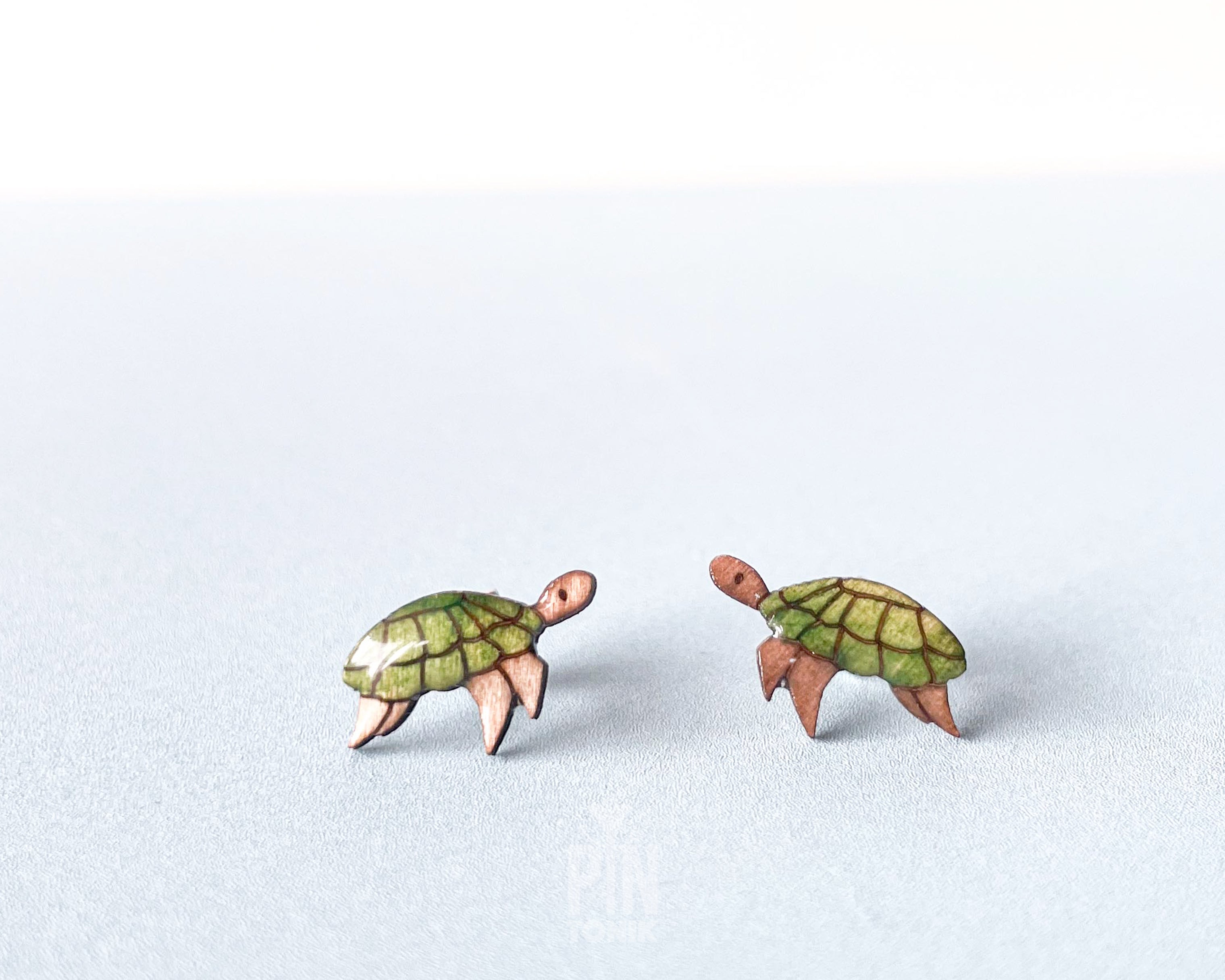 Handmade wooden sea turtle stud earrings with a beautiful teal and green shell design, Hawaiian honu beach style tropical jewelry by PinTonik.
