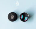 Handmade oversized wooden scallop shell stud earrings in pastel blue with bright pink accent lines by PinTonik.
