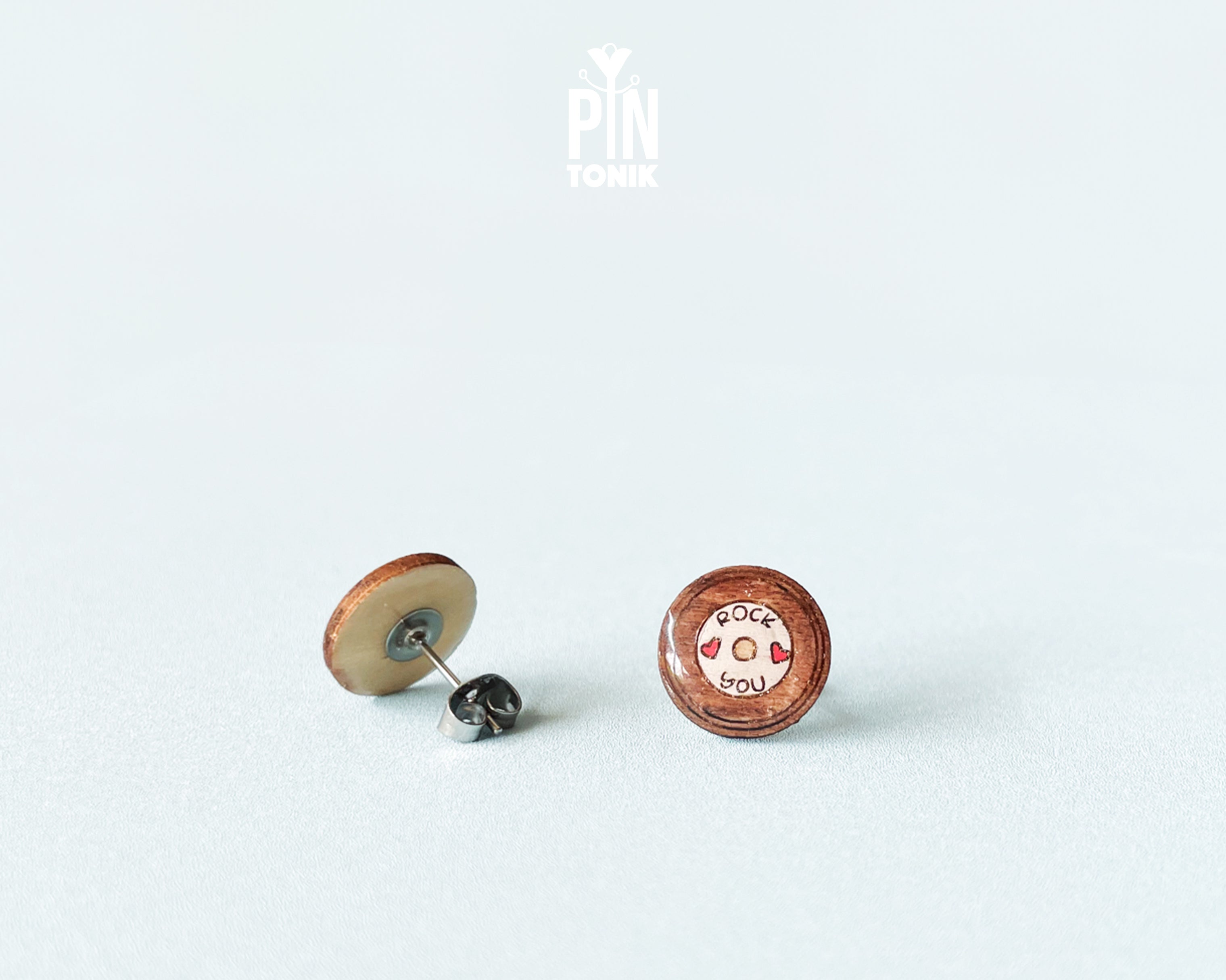 Handmade wooden vinyl record stud earrings in vintage brown with a center label reading 'ROCK ❤️ YOU' by PinTonik.