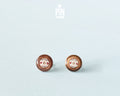 Handmade wooden vinyl record stud earrings in vintage brown with a center label reading 'ROCK ❤️ YOU' by PinTonik.